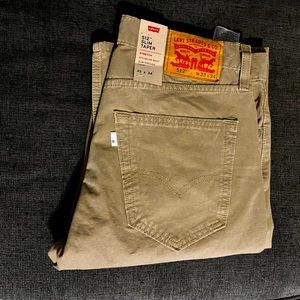 Brand new!! Men’s Levis pants size 33x34 tan